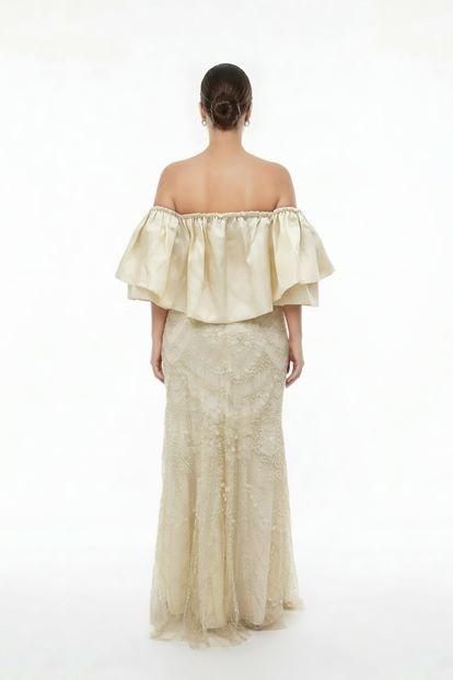 فستان سهرة بمقاسات كبيرة مزين بالترتر بلون العظم